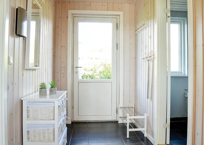 Casa de Férias Blomstervaenget Hemmet X